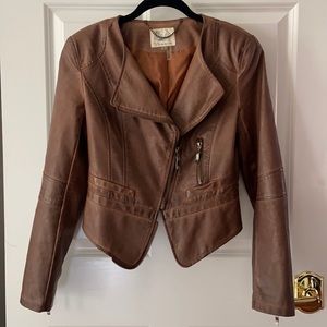 New, never worn, faux leather jacket. Beautiful, rich brown color.